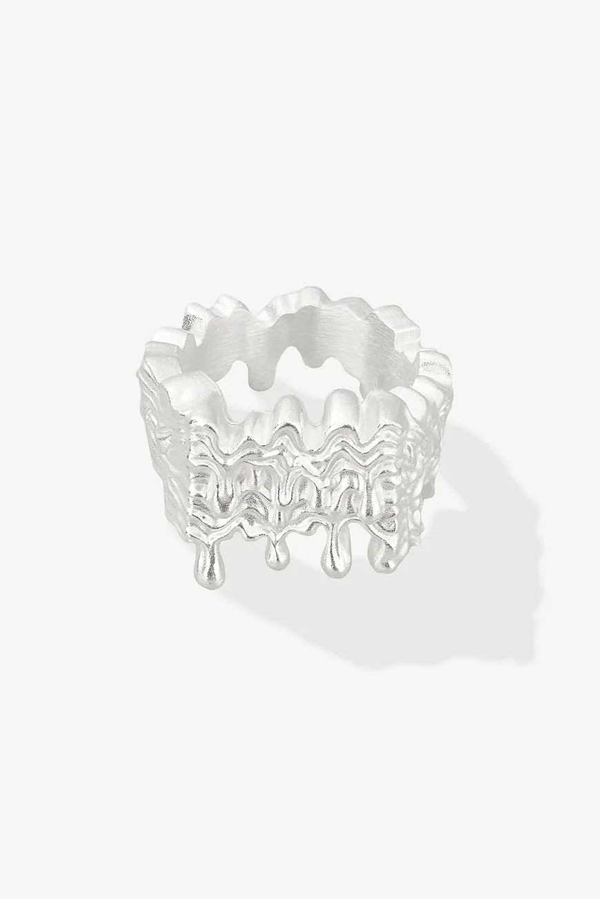 Silver ring with a melting texture