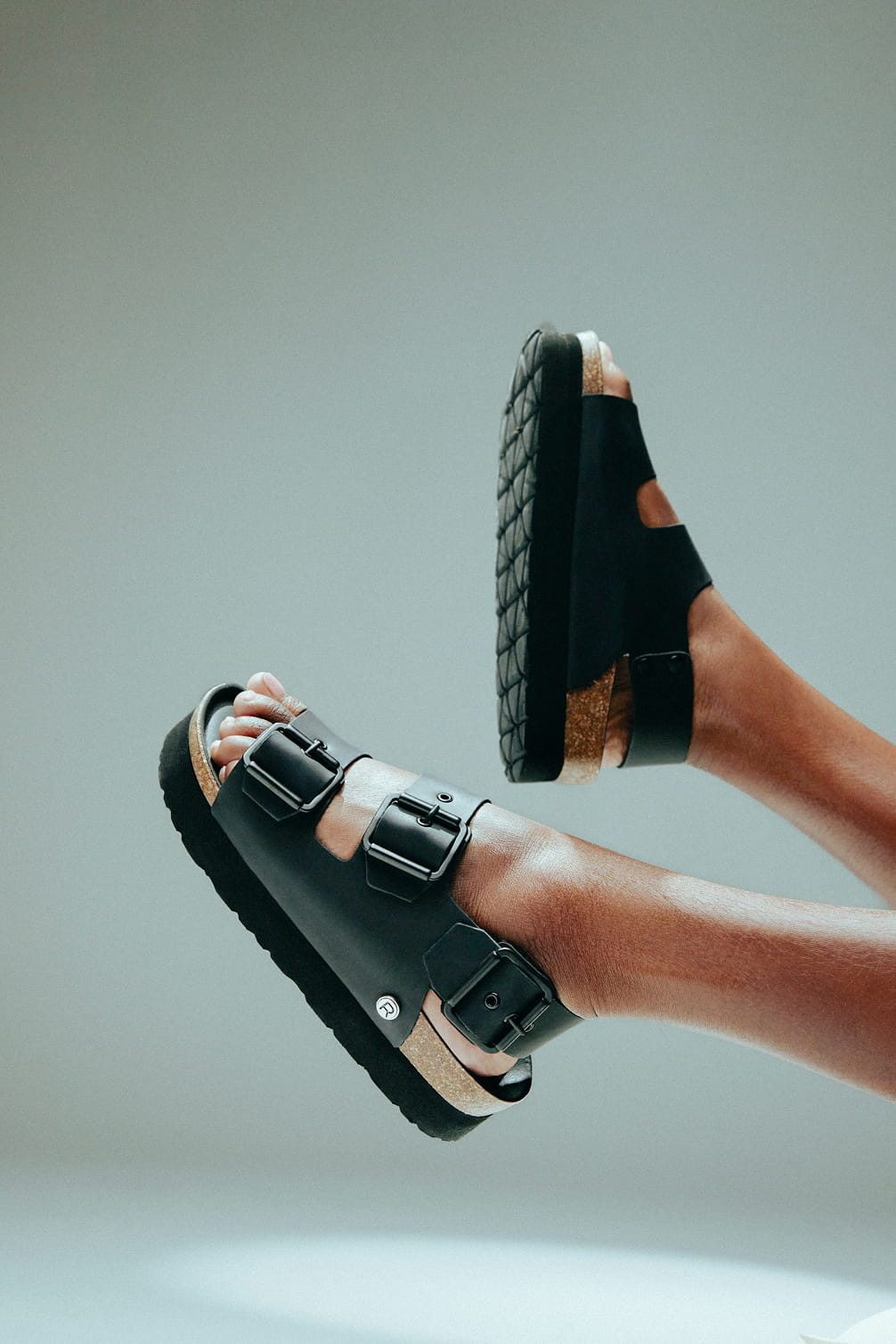 Black platform sandals with buckles